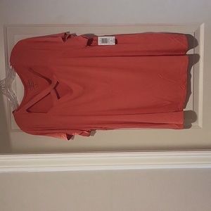 Torrid. Size 3. Peach tee shirt. Neckline cutout design. NWT.